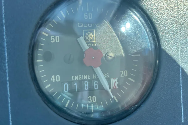 Slide: The Image of Engine hour meter showing 186 hours on a 1991 Tiara Yachts 3100 Open. - 22