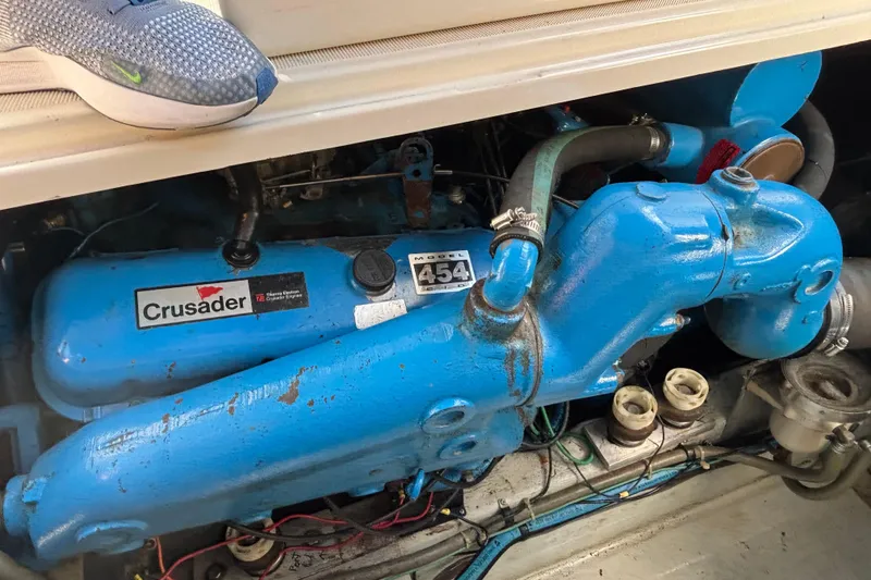 Slide: The Image of Engine compartment of a 1991 Tiara Yachts 3100 Open with Crusader engine. - 36