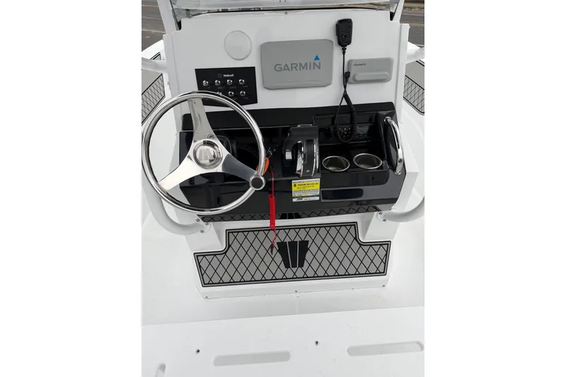 Slide: The Image of Center console of 2021 Wellcraft 202 Fisherman boat with Garmin navigation system. - 10