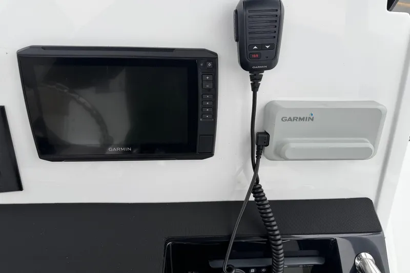 Slide: The Image of Garmin marine electronics on 2021 Wellcraft 202 Fisherman boat dashboard. - 11