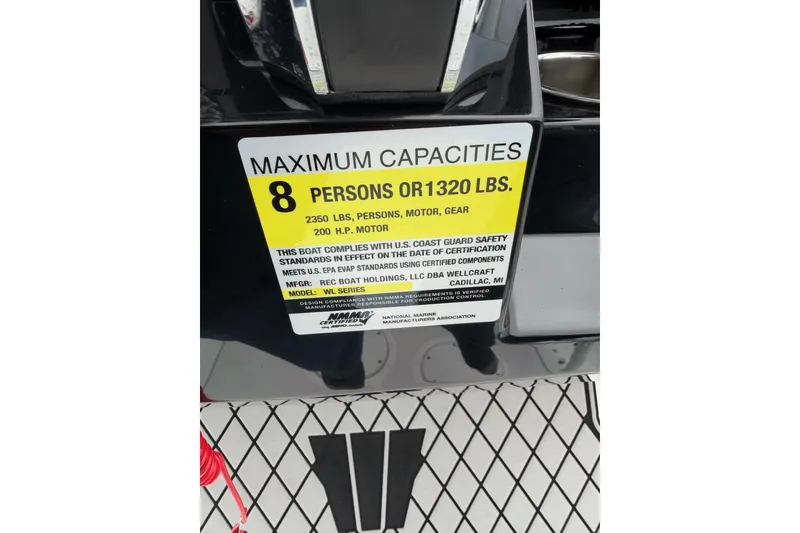 Slide: The Image of 2021 Wellcraft 202 Fisherman capacity label, max 8 persons or 1320 lbs, 200 HP motor. - 20