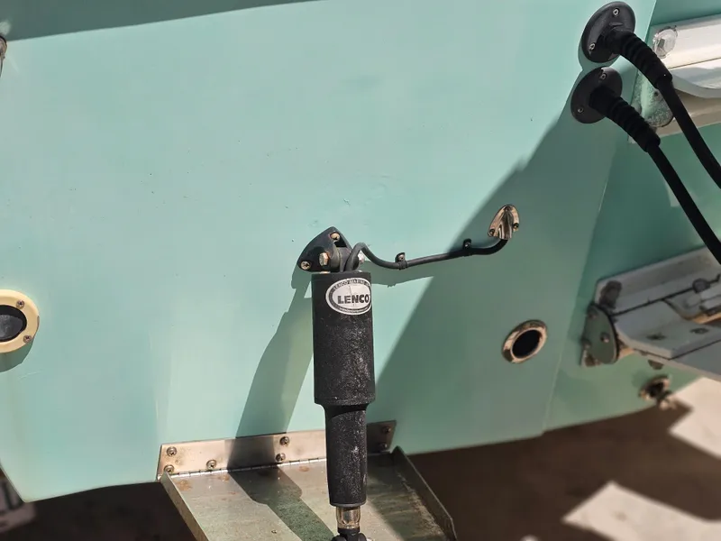 Slide: The Image of 2000 Dorado 23 boat featuring Lenco trim tab. - 20