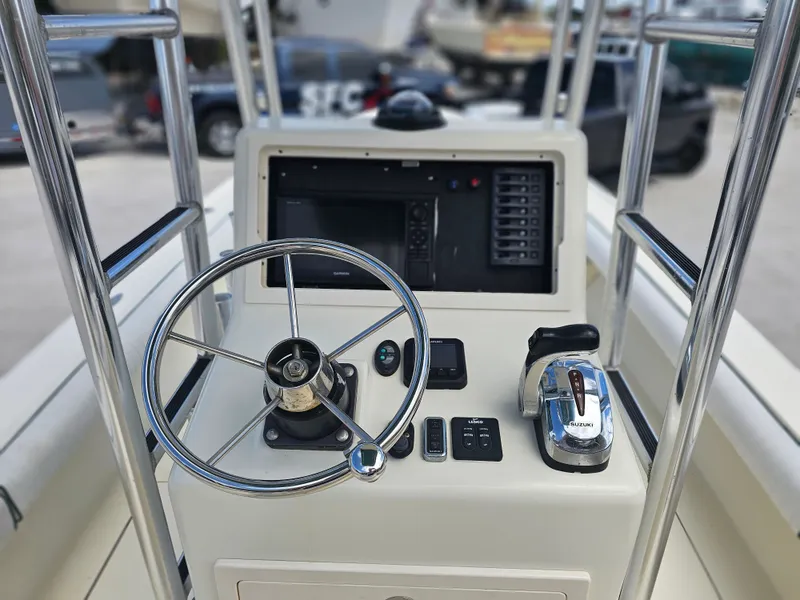 Slide: The Image of 2000 Dorado 23 boat helm with Garmin navigation system. - 45