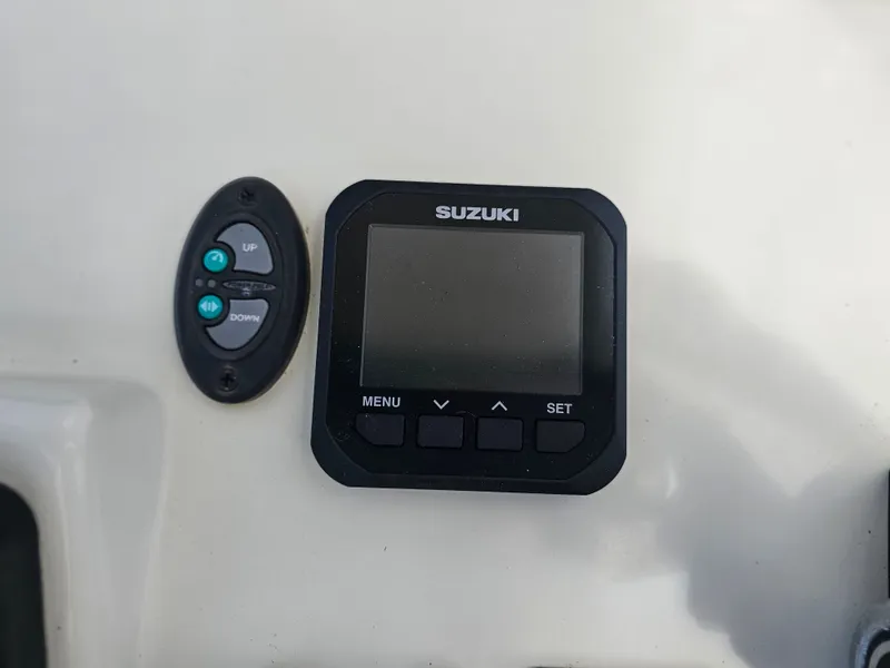 Slide: The Image of Suzuki boat control on Dorado 23, year 2000. - 48