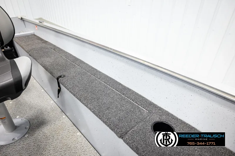 Slide: The Image of Interior of 2025 Lund 1600 Fury SS boat with seating and storage. - 19