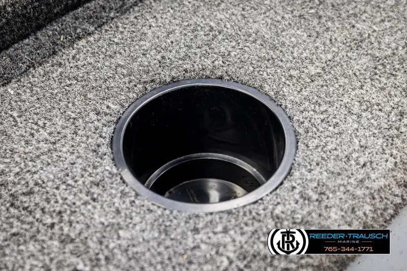 Slide: The Image of Carpeted floor with cup holder in 2025 Lund 1600 Fury SS boat. - 35