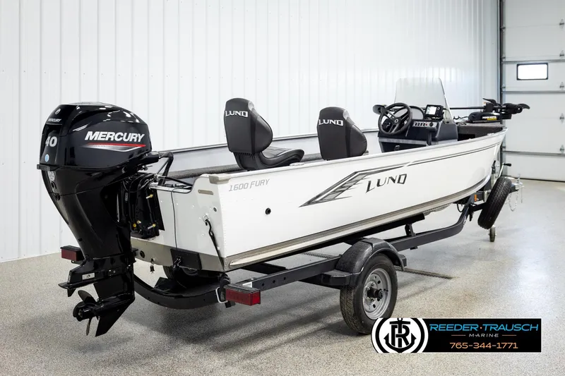 Slide: The Image of 2025 Lund 1600 Fury SS boat with Mercury engine in showroom. - 4