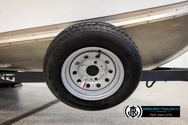Slide: The Image of Trailer wheel of 2025 Lund 1600 Fury SS boat, displayed at Reeder-Trausch Marine. - 42