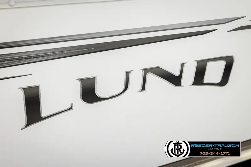 Slide: The Image of 2025 Lund 1600 Fury SS boat logo with sleek design details. - 44
