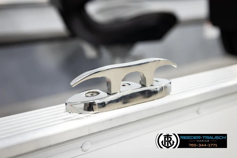 Slide: The Image of Chrome cleat on 2025 Lund 1600 Fury SS boat, Reeder-Trausch Marine branding visible. - 47