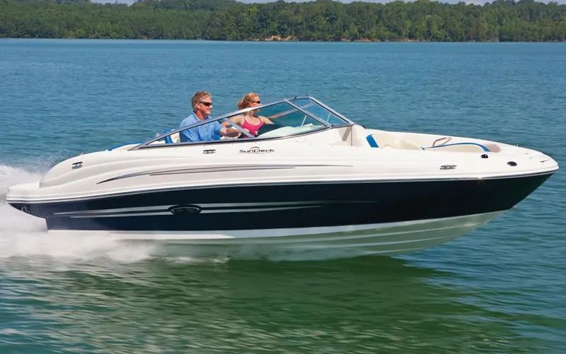 Slide: The Image of Manufacturer Provided Image: 2012 Sea Ray 200 Sundeck boat cruising on a lake. - 6