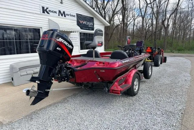 Slide: The Image of Red 1999 Ranger 461VS boat with Mercury engine at Knox Marine dealership. - 3