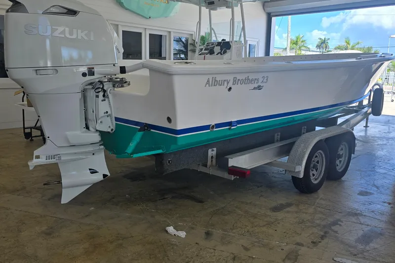 Slide: The Image of 2023 Albury Brothers 23 Forward Seating boat on trailer with Suzuki engine. - 1