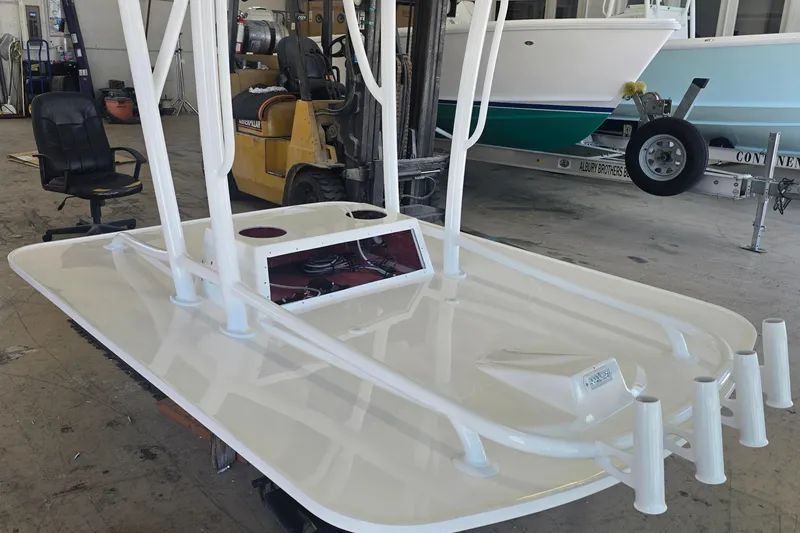 Slide: The Image of 2023 Albury Brothers 23 Forward Seating boat under construction in a workshop. - 4