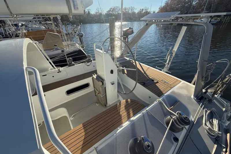 Slide: The Image of Cockpit of 2017 Boreal 47 sailboat with wooden deck and steering wheel. - 15
