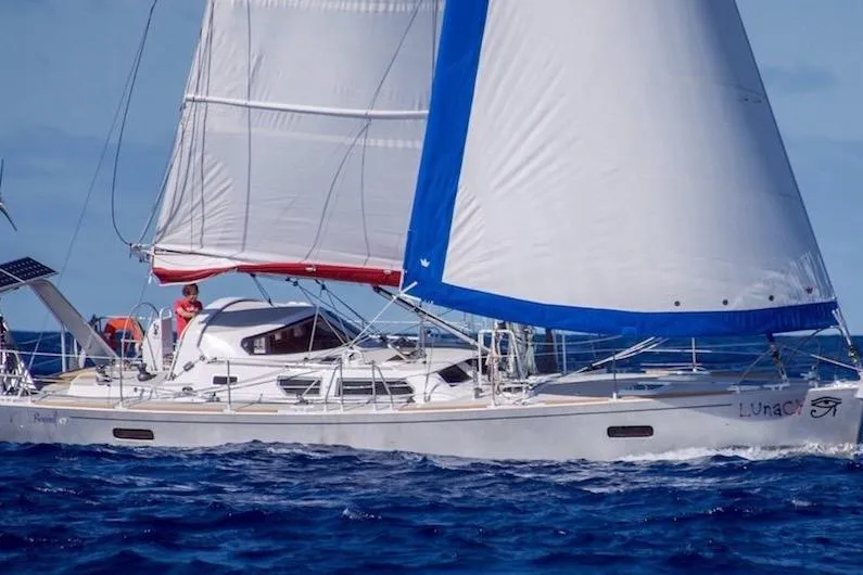 Slide: The Image of Sailing yacht Boreal 47, 2017 model, navigating ocean waters with full sails. - 2