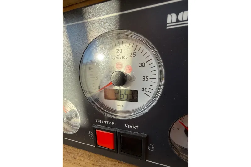 Slide: The Image of Close-up of Boreal 47 tachometer, showing RPM and control buttons, 2017 model. - 30