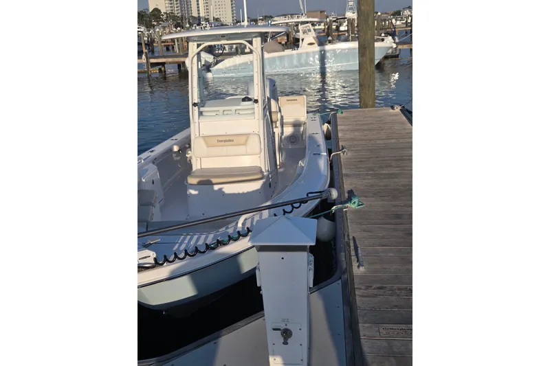 Slide: The Image of 2017 Everglades 243 Center Console boat docked at marina. - 3
