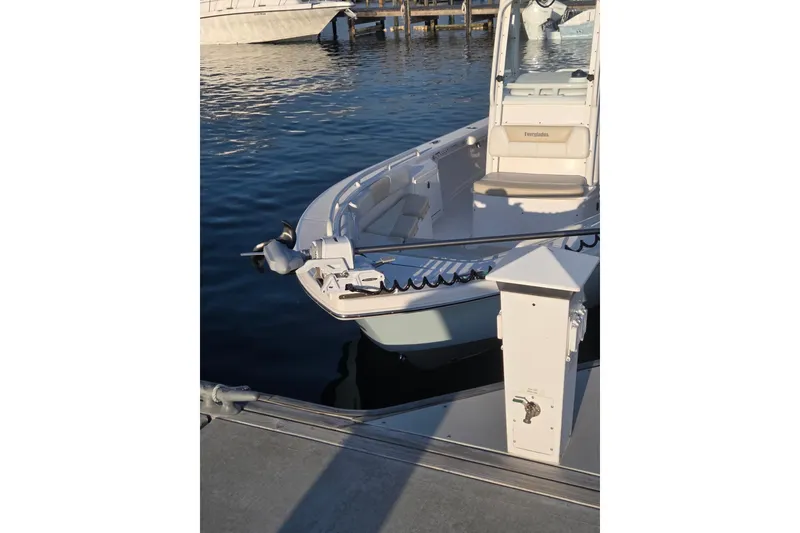 Slide: The Image of 2017 Everglades 243 Center Console boat docked at marina. - 4