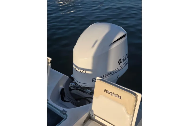 Slide: The Image of 2017 Everglades 243 Center Console boat with Yamaha outboard engine on water. - 7