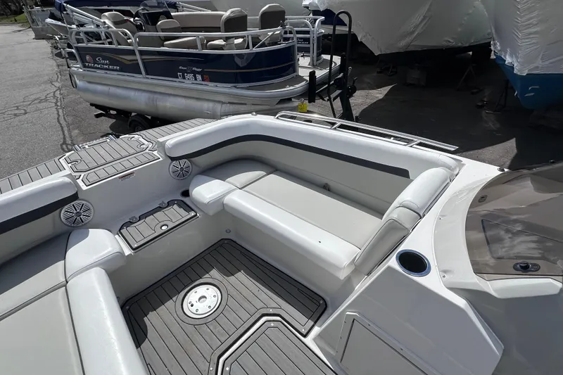 Slide: The Image of 2023 Starcraft SVX 191 OB boat interior with seating and cup holder. - 13