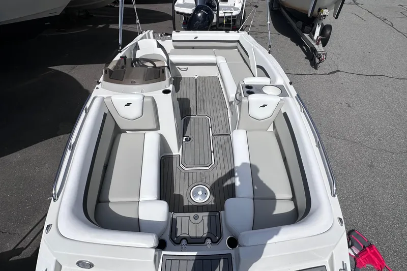 Slide: The Image of 2023 Starcraft SVX 191 OB boat interior with gray seating and modern design. - 17