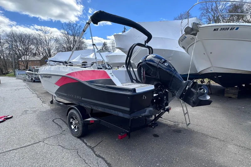 Slide: The Image of 2023 Starcraft SVX 191 OB boat with outboard motor on trailer. - 3