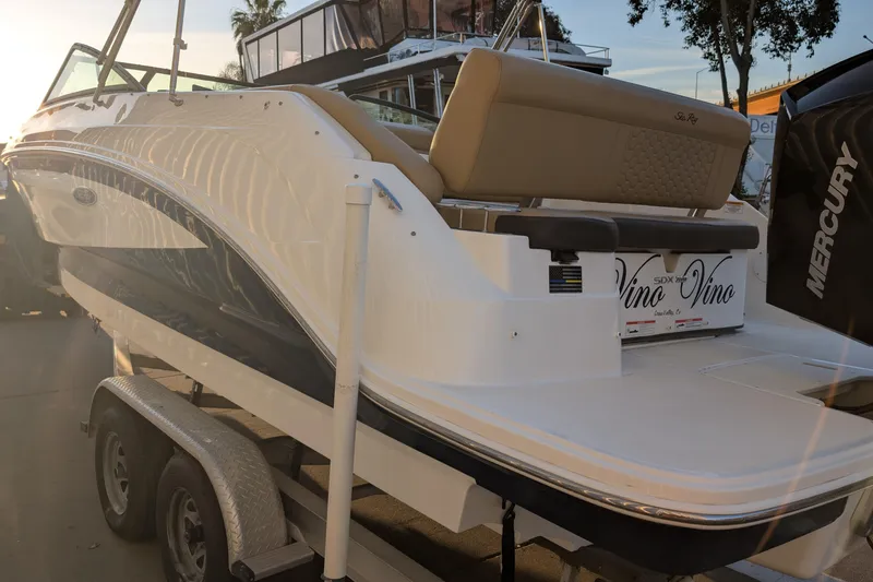 Slide: The Image of 2022 Sea Ray SDX 250 Outboard boat on trailer, featuring sleek design and Mercury engine. - 3