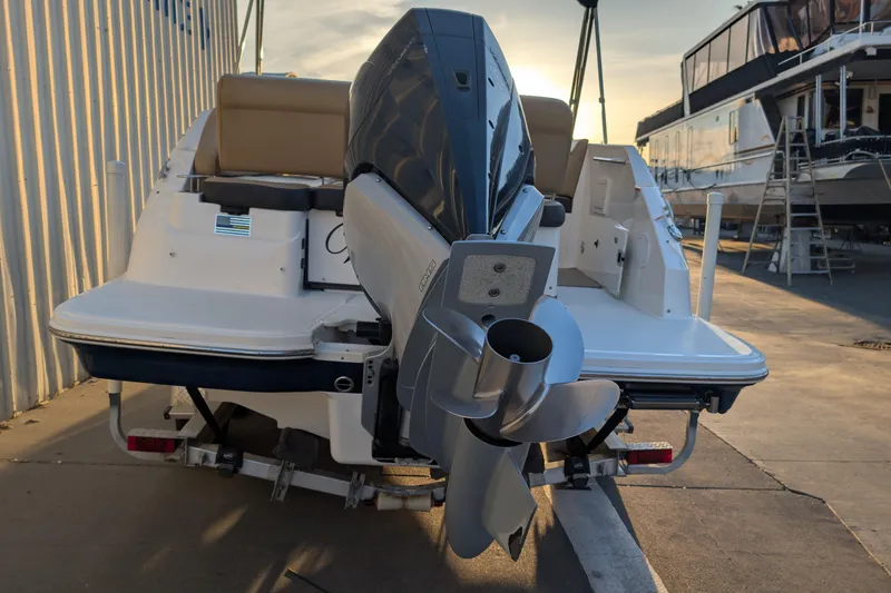Slide: The Image of 2022 Sea Ray SDX 250 Outboard boat with powerful engine, docked at marina. - 4