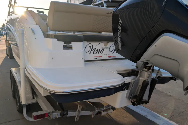 Slide: The Image of 2022 Sea Ray SDX 250 Outboard boat with Mercury engine on trailer. - 6