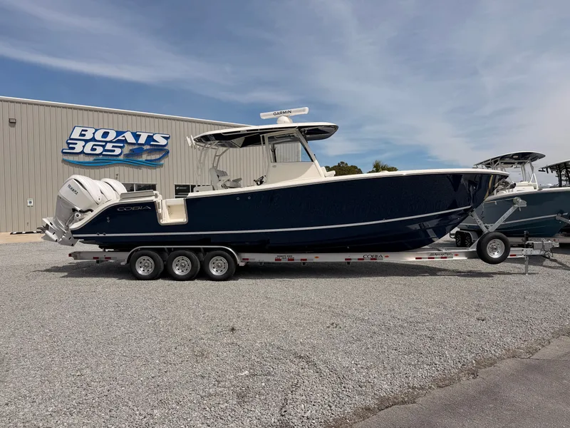 Slide: The Image of 2025 Cobia 350 Center Console boat on trailer at Boats 365. - 1