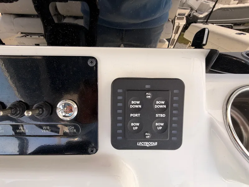 Slide: The Image of Control panel of 2025 Cobia 350 Center Console with switches. - 17