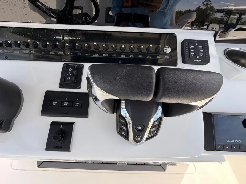 Slide: The Image of Control console of the 2025 Cobia 350 Center Console boat model. - 20