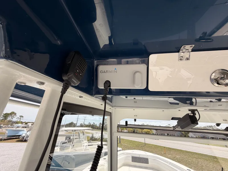 Slide: The Image of Interior view of 2025 Cobia 350 Center Console with Garmin equipment. - 22