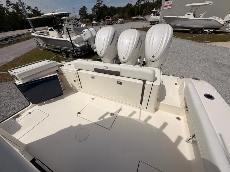 Slide: The Image of Cobia 350 Center Console 2025 with triple outboard engines. - 23