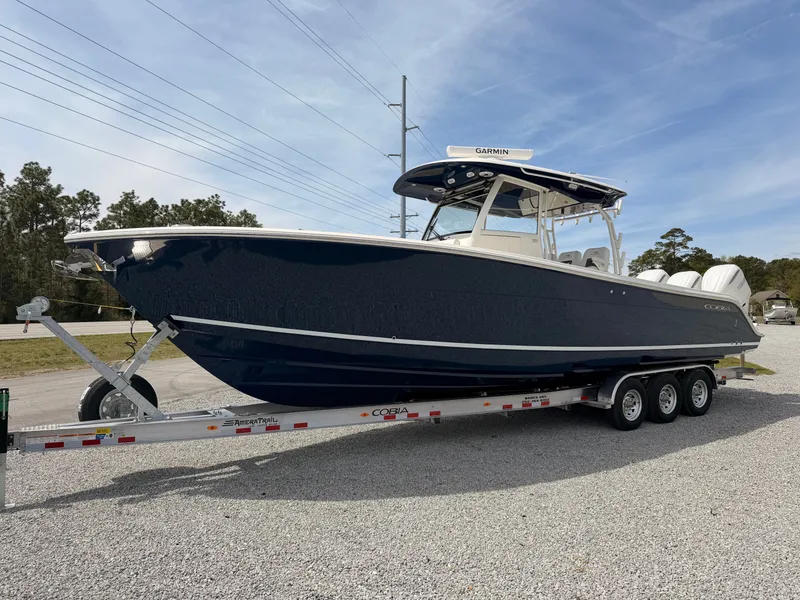 Slide: The Image of 2025 Cobia 350 Center Console boat on trailer. - 3