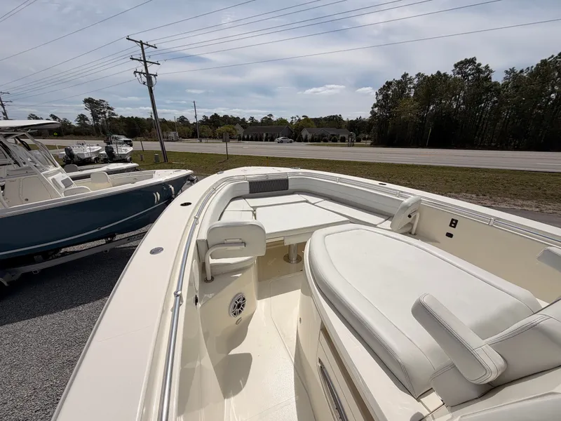 Slide: The Image of 2025 Cobia 350 Center Console boat on display. - 8