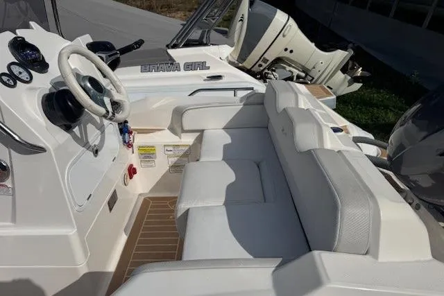 Slide: The Image of 2018 Zar Formenti 49 SL boat interior with white seating and steering wheel. - 7