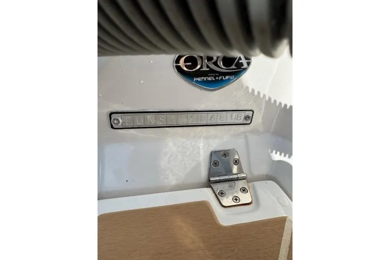 Slide: The Image of 2018 Zar Formenti 49 SL boat detail with Orca logo and serial number plate. - 8