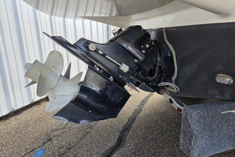 Slide: The Image of 2014 Rinker 290 Express Cruiser with MerCruiser outdrive and dual propellers. - 9