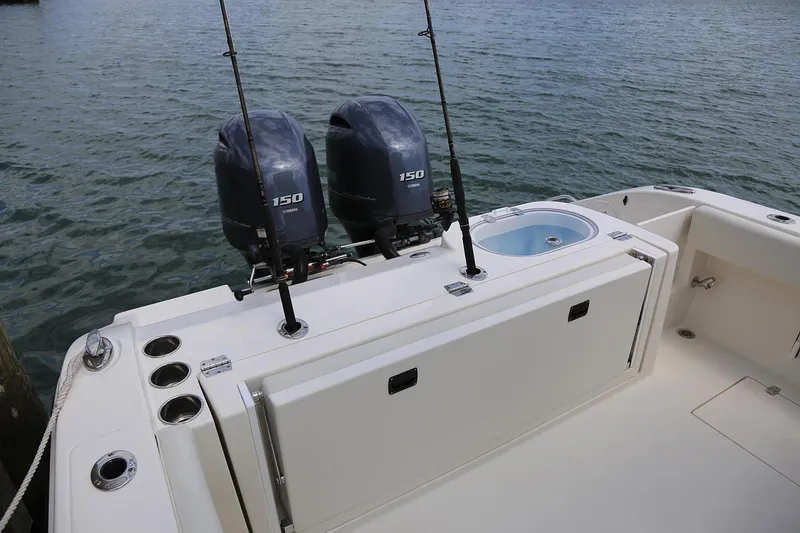 Slide: The Image of Manufacturer Provided Image: 2018 Cobia 261 Center Console boat with twin 150 HP engines. - 18