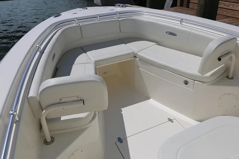 Slide: The Image of Manufacturer Provided Image: 2018 Cobia 261 Center Console boat with spacious seating area. - 20
