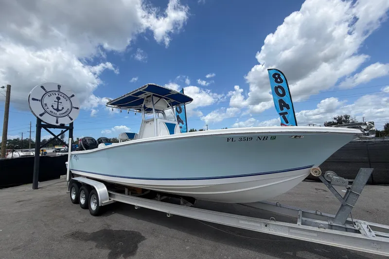 The Image of 2006 Ocean Runner 2900 C/C Open Fisherman on trailer under cloudy sky. - 0