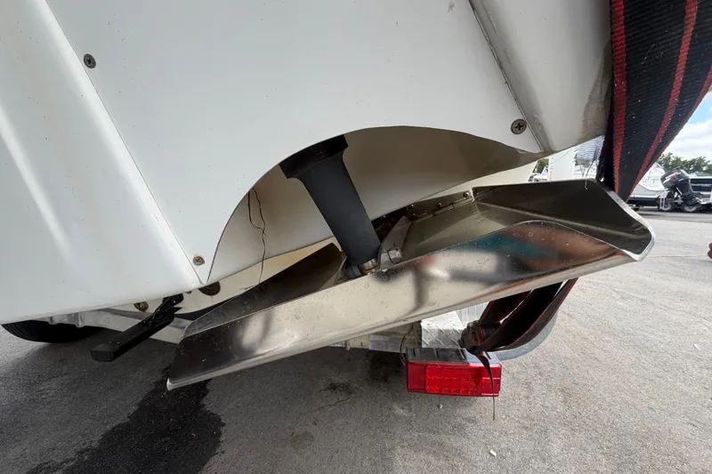 Slide: The Image of Close-up of 2006 Ocean Runner 2900 C/C Open Fisherman boat's hull and trim tab. - 14