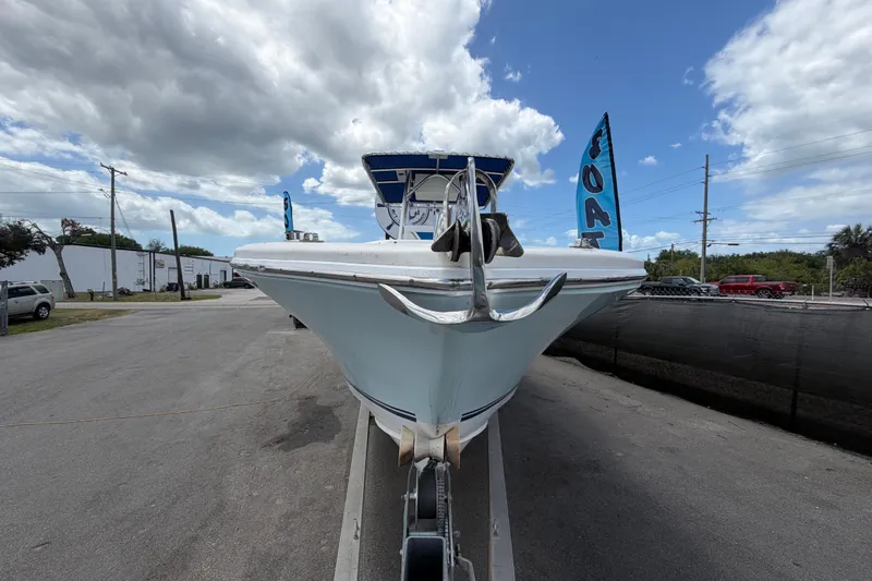 Slide: The Image of 2006 Ocean Runner 2900 C/C Open Fisherman boat on trailer under cloudy sky. - 21