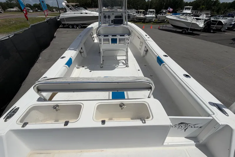 Slide: The Image of 2006 Ocean Runner 2900 C/C Open Fisherman boat, spacious deck, dual storage compartments. - 25