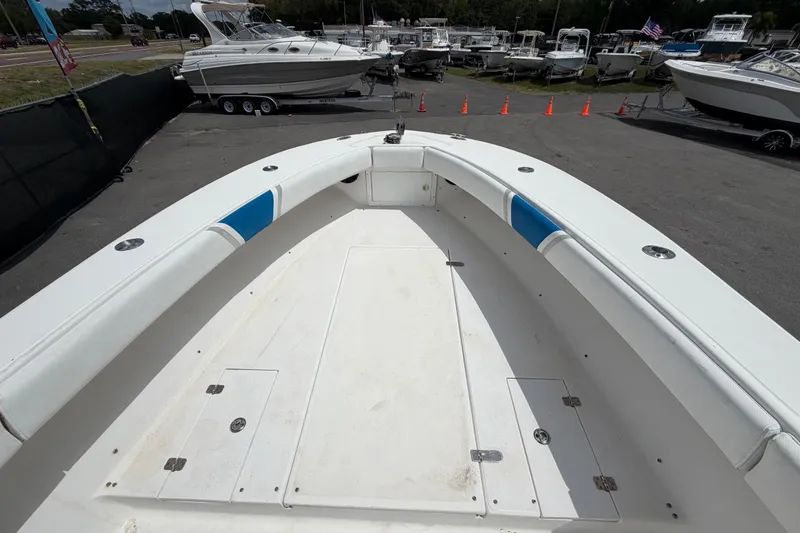 Slide: The Image of 2006 Ocean Runner 2900 C/C Open Fisherman boat, spacious deck view at marina. - 43