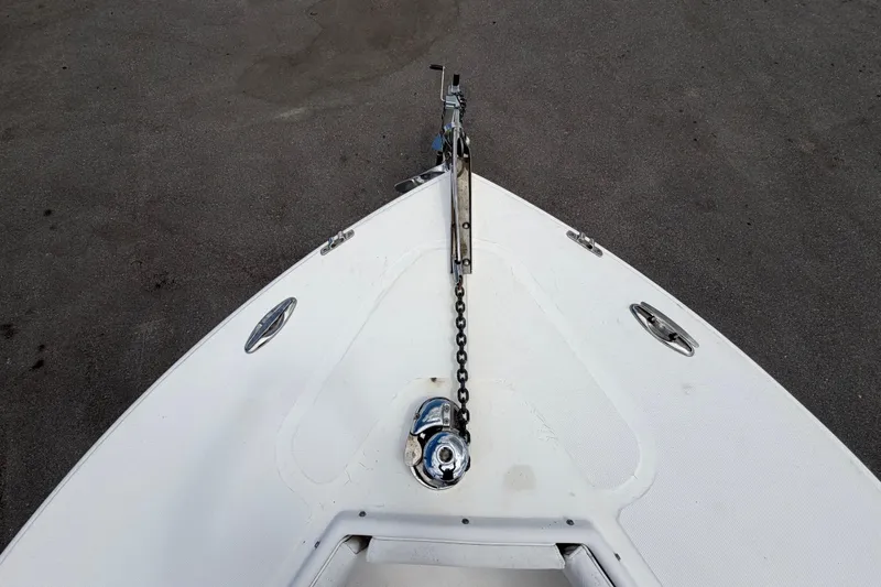 Slide: The Image of Bow of 2006 Ocean Runner 2900 C/C Open Fisherman with anchor chain and cleats. - 49