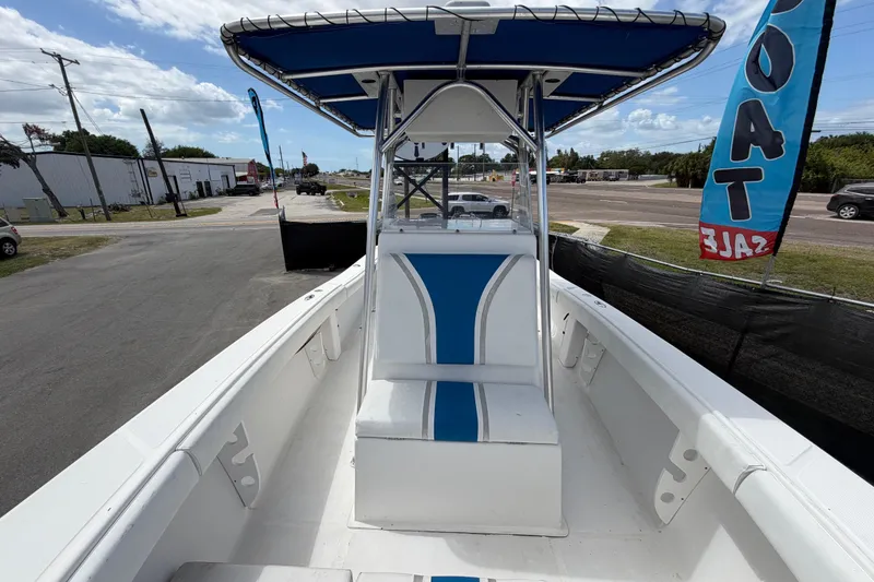 Slide: The Image of 2006 Ocean Runner 2900 C/C Open Fisherman boat with blue accents, displayed for sale. - 51