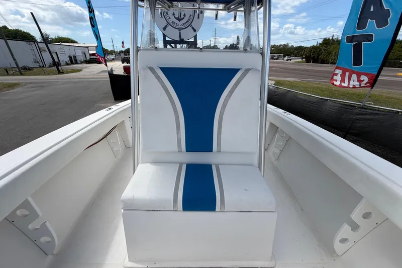 Slide: The Image of 2006 Ocean Runner 2900 C/C Open Fisherman boat with blue and white seating. - 52